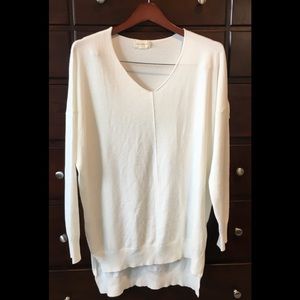 Women’s Dreamer” cream colored sweater